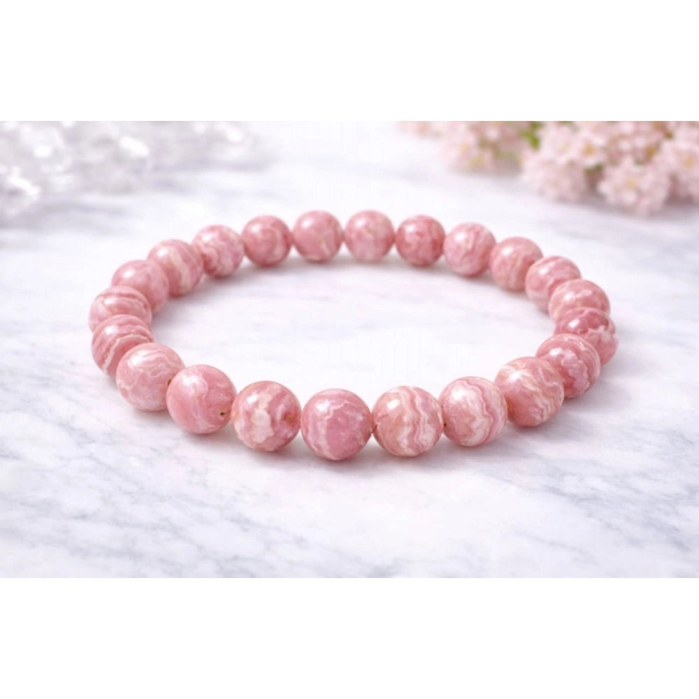 Suvarnika Natural Crystal 8mm Rhodochrosite Bracelet (Pink)